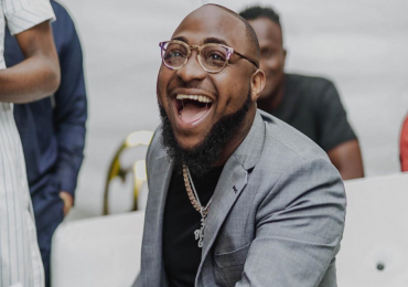 DAVIDO TURNS ONLINE CLASH INTO ACT OF KINDNESS, PROMISES TO SET UP FAN’S SHOP